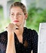 Woman reading newspaper