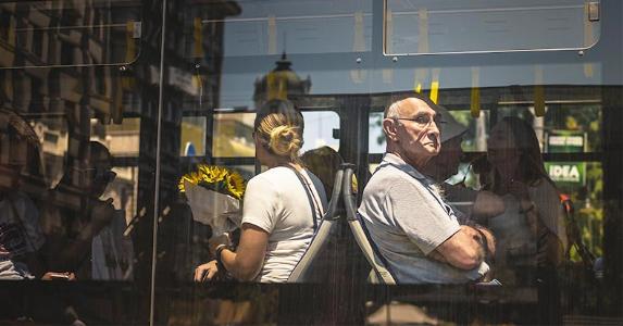 Penalty-free IRA withdrawals People sitting in the bus | Søren Astrup Jørgensen/Stocksnap