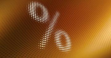 Percent sign, yellow-brown background | Ralf Hiemisch/Getty Images