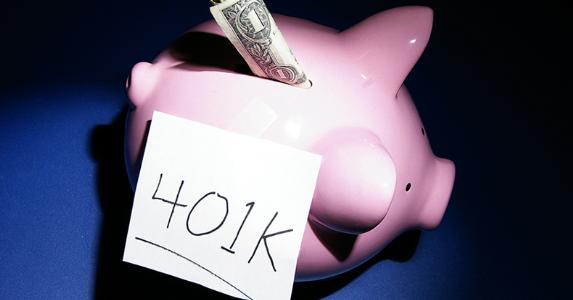 Piggy bank with dollar and 401k © zimmytws/Shutterstock.com