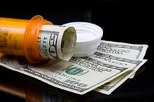 Prescription pill bottle and money