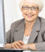 Professional senior woman using a computer