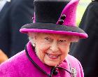 5 things to know about Brexit Smiling Queen Elizabeth II wearing pink and black hat and coat | Mark Cuthbert/Getty Images