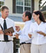 Home buyers talking to realtor