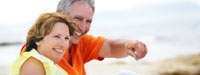 Retired couple on beach