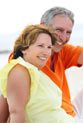 Retired couple on beach