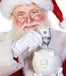 Santa claus holding piggy bank.