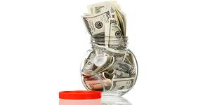 Savings money jar © DenisNata/Shutterstock.com