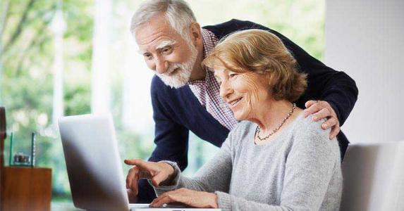 2016 tax exemption amounts Senior couple browsing laptop at home | Anadolu Agency/Getty Images