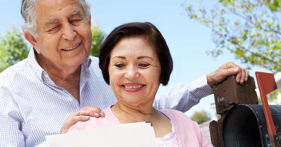 How to track your tax refund Senior couple checking mailbox | Monkey Business Images/Shutterstock.com