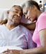 Senior couple embracing in hospital