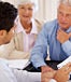 Senior couple meeting with financial adviser