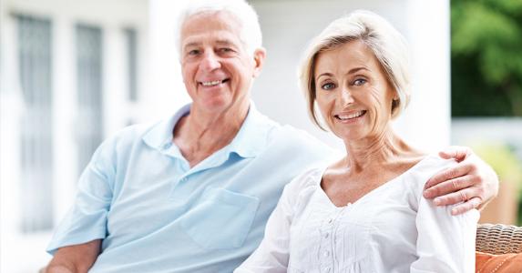 Senior couple seated together © iStock