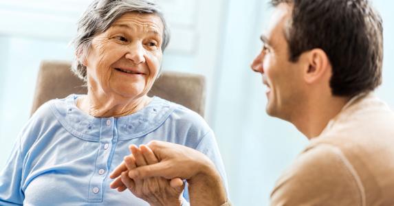 Senior mother speaking with son