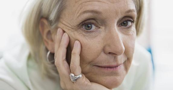 Huge medical bills, tiny income. What now? Senior woman looking at the camera | Hero Images/Getty Images