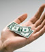 Shrinking dollar in hand
