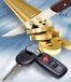 gold money sign being cut with knife and car keys
