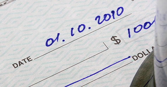 Successfully cashing old checks © Constantine Pankin/Shutterstock.com
