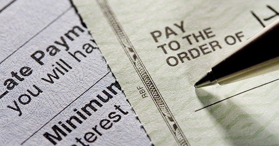 Always pay bills on time © photastic/Shutterstock.com