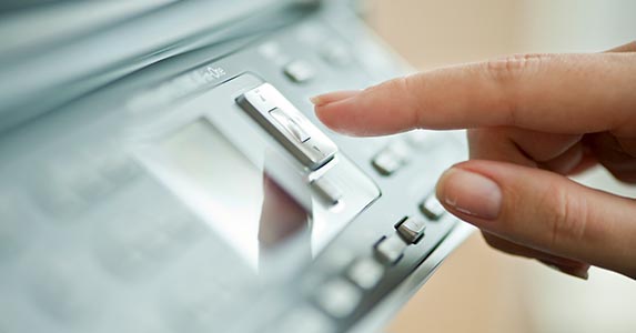 Copying U.S. currency Copying U.S. currency | Tetra Images/Getty Images