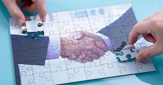 Health care mergers may impact prices Health care mergers may impact prices | iStock.com/johnnyscriv