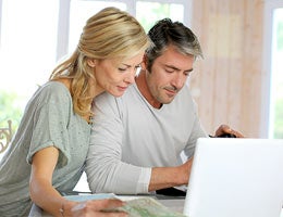 Questions to ask before refinancing a vacation home © Goodluz/Shutterstock.com