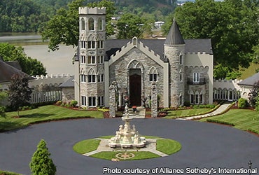 A lakefront castle with racetrack