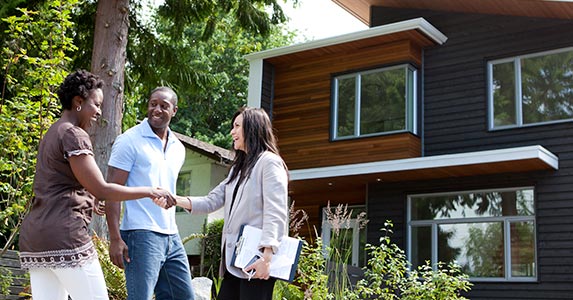 Real estate agents Real estate agents | Noel Hendrickson/Blend Images/Getty Images