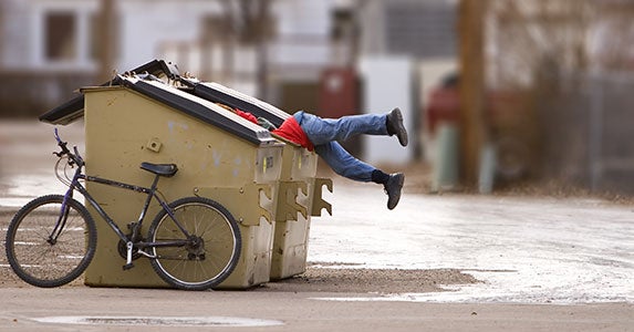 Dumpster diving in cemeteries? © Stephen Mcsweeny/Shutterstock.com