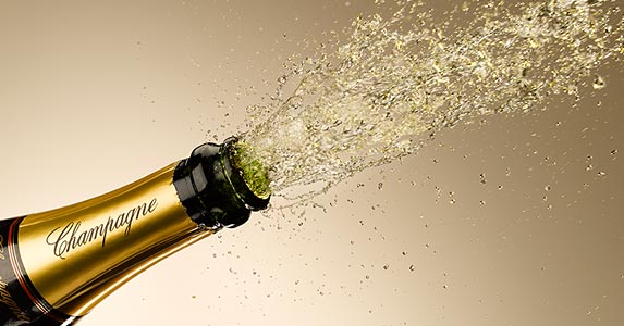 A bottle of champagne A bottle of champagne | Andy Roberts/OJO Images/Getty Images