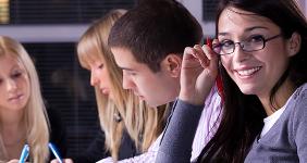 Smiling female student in study group © Coka - Fotolia.com