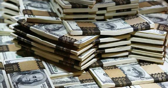 IRS has $950 million in unclaimed refunds Stacks of $100 bills | iStock.com/Ieva