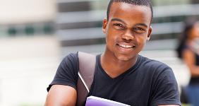 Smiling student holding bag and book © michaeljung/Shutterstock.com