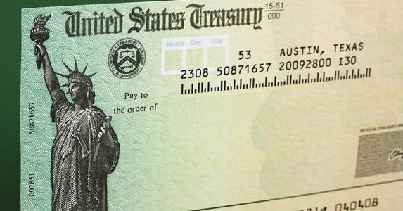 tax refund check with green background_573x300