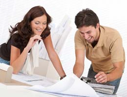 tips-for-hiring-interior-designer-4-budget-lg Architect and client working with a plan