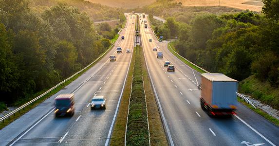 Various vehicles in highway traffic © iStock