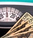 Scale and $20 bills
