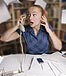 woman at messy desk