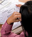 Woman looking at credit card statement