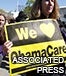 woman obamacare sign