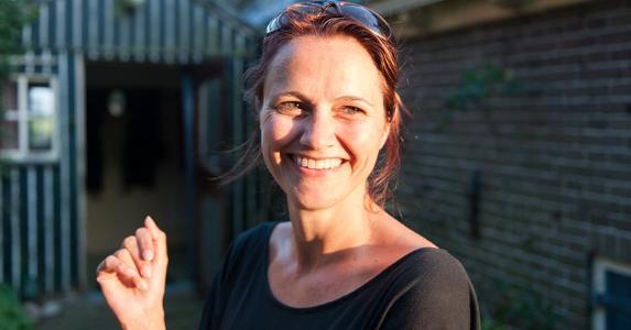 Disclose problems when selling house 'as is' Woman smiling into the sunlight | Lucy Lambriex/Moment/Getty Images
