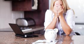 Woman upset about finances © michealjung/Shutterstock.com