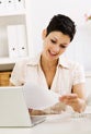 Woman with paperwork.