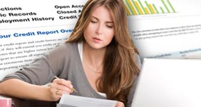 Women reading credit report