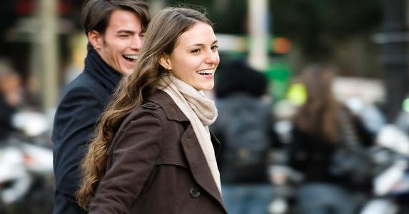 Personal loan rate stays the same Young couple wearing coats, walking | PhotoAlto/Eric Audras/Brand X Pictures/Getty Images