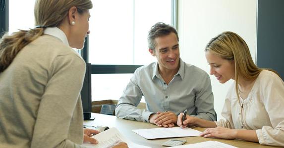 3 times when we still need bank branches Young couple meeting with adviser | PhotoAlto/Eric Audras/Getty Images