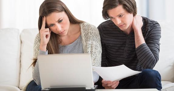 Mortgages For Poor Credit Young couple thinking together iStock.com