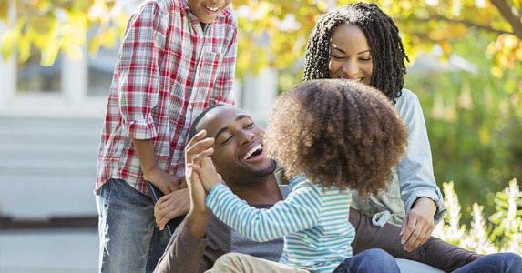 The estate and gift tax rules for 2016-2017 Young family laughing and hugging outdoors | Paul Bradbury/Getty Images