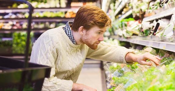 You're doing it wrong: How not to handle your tax refund Young man buying produce in grocery store | Maskot/Getty Images