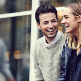 Young people laughing together | Plume Creative/DigitalVision/Getty Images